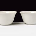 An exceptional pair of blanc-de-Chine porcelain cups with secret decoration, Shunzhi period (1644-1661)