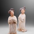 Two impressive painted pottery figures of court ladies, Tang dynasty (618-907)