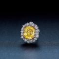 A Highly Important 41.08 Carat Fancy Intense Yellow, Internally Flawless Diamond and Diamond Ring-Pendant