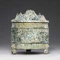 A green-glazed red pottery tripod vessel and cover, lian, Western Han dynasty (206 BC-AD 8)