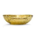 A gilt-bronze ear cup, Han dynasty