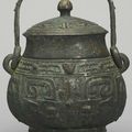 A bronze ritual wine vessel and cover (you), Late Shang dynasty, 12th-11th century BC