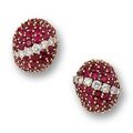 A pair of ruby and diamond earrings, by Cartier