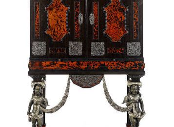 A Flemish late 17th century pewter and ivory-inlaid and silvered mounted tortoiseshell, ebony and rosewood cabinet on stand