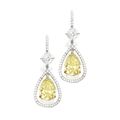 Pair of platinum, 18 karat gold, fancy yellow diamond and diamond earrings