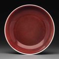 A copper-red-glazed dish, Qianlong six-character seal mark in underglaze blue and of the period (1736-1795)