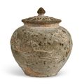 A carved steatite jar and cover, Tang dynasty (618-907)
