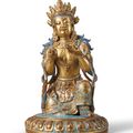 A gilt-decorated and enamelled figure of Avalokitesvara, Qing dynasty, 18th-19th century
