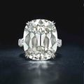 A 23.39 carats, L color, SI1 clarity cushion brilliant-cut diamond ring