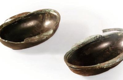 A pair of rhinoceros hide lacquer ear cups unearthed from Zhu Ran's tomb, Three Kingdoms period (220-280 AD)