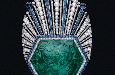 An Art Deco carved emerald, sapphire, diamond and pearl aigrette, Paul Iribe for Robert Linzeler