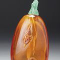An amber ‘Bat and mythical beast’ snuff bottle, Qing dynasty, mid 18th-early 19th century