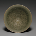 A rare small molded Yaozhou conical bowl, Northern Song dynasty, 11th century