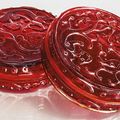 A rare pair of transparent red glass 'chilong' boxes and covers, Qing dynasty, 18th century