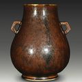 An iron-rust-glazed archaistic vase (hu), Qing dynasty, 19th century