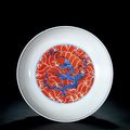 An Iron-Red And Underglaze-Blue ‘Dragon And Waves’ Saucer Dish, Yongzheng Period, 1723-1735