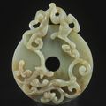 An archaistic crayish-celadon jade 'chilong' bi-disc, 17th-18th century