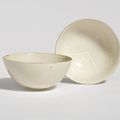 Two small carved 'Ding' bowls, Jin dynasty (1115-1234)