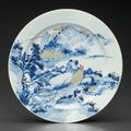 An underglaze-blue and copper-red decorated celadon-glazed dish, Kangxi period, circa 1700