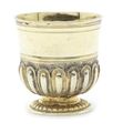 A late 17th century Latvian silver-gilt vodka cup, makers mark 'HE(?)' within conjoined circles, Riga, circa 1680