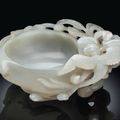 A white jade peach-form brush washer, Yuan-Early Ming dynasty, 13th-15th century