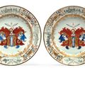 A pair of Dutch market armorial plates, circa 1740