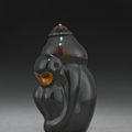 A lacquer on wood 'monkey' snuff bottle, Fuzhou, probably Imperial, 1750-1850