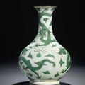 A very rare Green-Enamelled ‘Dragon’ Bottle Vase, Daoguang iron red six-character seal mark and of the period (1821-1850)