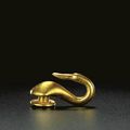 A fine gold garment-hook, Warring States Period 