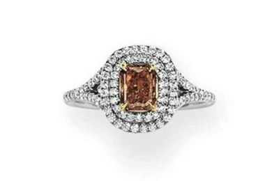 A cut-cornered rectangular-cut fancy red diamond and diamond ring