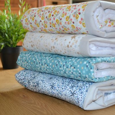 Une pile de de plaid tout doux...