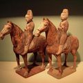 A Pair of Chinese Tang dynasty painted pottery horses and riders. China, Tang Dynasty