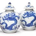 A fine and rare pair of blue and white 'Dragon' jarlets and covers, Kangxi marks and period(1662-1722)