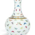 A famille-rose ‘Hundred Butterflies' bottle vase, Guangxu mark and period (1875-1908)