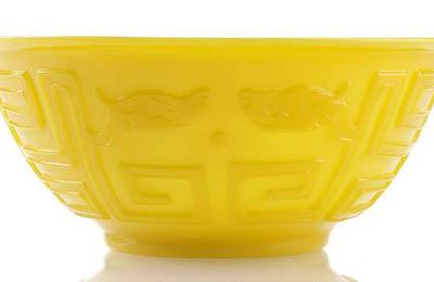 A fine and rare  yellow Beijing glass bowl with stylized dragons, China, Qianlong period