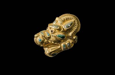 A Sarmatian gold lion griffin head appliqué, Northern Black Sea or Central Asian Steppes, circa 2nd century B.C.-1st century A.D