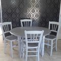 Table ronde en chêne + 4 chaises 