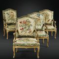 Suite de quatre fauteuils en bois sculpté et redoré d'époque Régence, les tapisseries en laine et soie d'après Maria Sibylla Mér