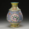 A rare famille-rose reticulated revolving vase, Qianlong seal mark and period (1736-1795)