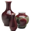 A LARGE CHINESE PORCELAIN COPPER RED GLAZED DOUBLE GOURD-FORM VASE AND A LARGE BOTTLE VASE, 20TH CENTURY 