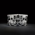 An important and extremely rare silver-inlaid bronze corner-piece, Eastern Zhou dynasty, Warring States period