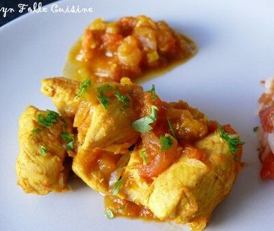 Poulet aux pommes, tomates et curry
