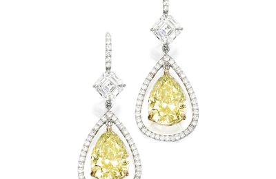 Pair of platinum, 18 karat gold, fancy yellow diamond and diamond earrings