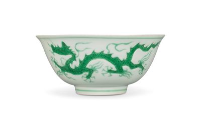 An incised green-enamelled 'dragon' bowl & an incised green-enamelled 'dragon' dish, Zhengde marks and period