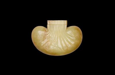 A yellow jade 'bird and flowers' pomander and cover, Ming dynasty