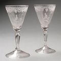 Deux verres en verre soufflé, la jambe à grande bulle d'air, pied soulevé ourlé. XVIIIe siècleDeux verres en verre soufflé, 