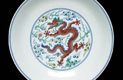 A doucai 'dragon' dish. Yongzheng six-character mark and of the period
