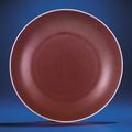 A copper-red glazed dish, Yongzheng six-character mark within double-circles and of the period (1723-1735)