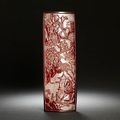 A red overlay glass wristrest. Incised Qianlong six-character marks, 19th century