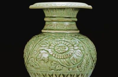 A carved and moulded  'Longquan' celadon 'chrysanthemum' vase. Ming Dynasty